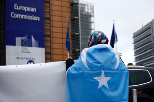 Brussels, Belgium. 5th Feb. 2019. Activists protest the treatment of Uyghur Muslims by Chinese authorities in Xinjiang province at a protest outside the headquarters of the European Union. Alexandros Michailidis/ Shutterstock.com